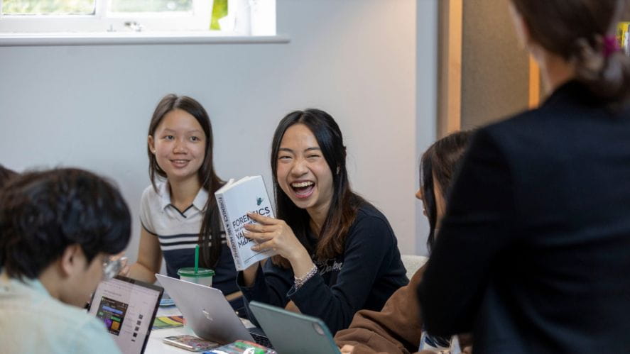 A girl smiling with friends